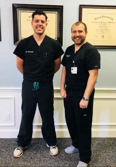 Dr-Salvati-and-Dr-Gonzalez-standing-in-office Dr-Salvati-and-Dr-Gonzalez-standing-in-office.